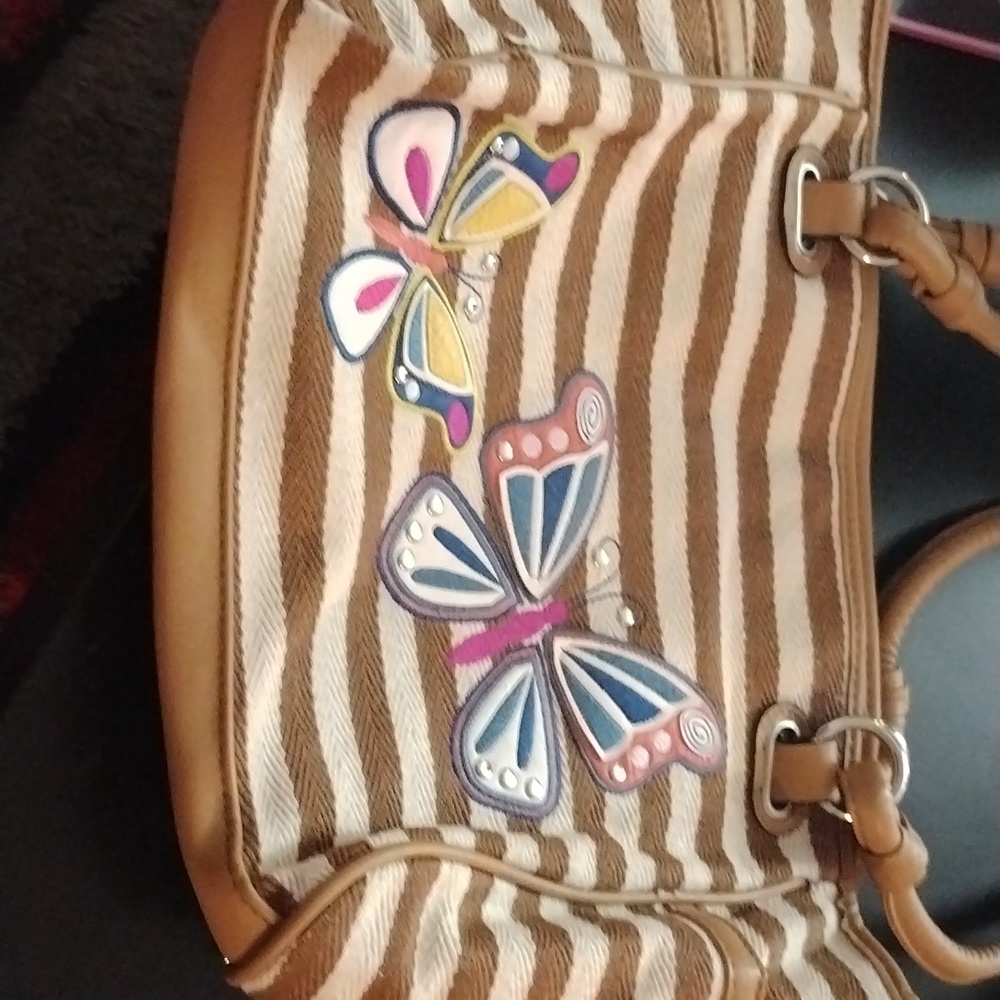 Slightly used Rossetti butterfly bag